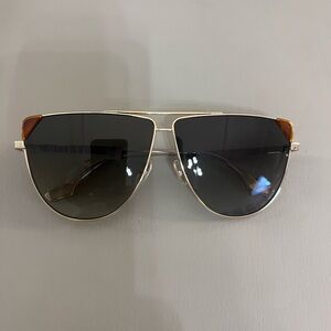 Victoria Beckham Black and Gold Sunglasses